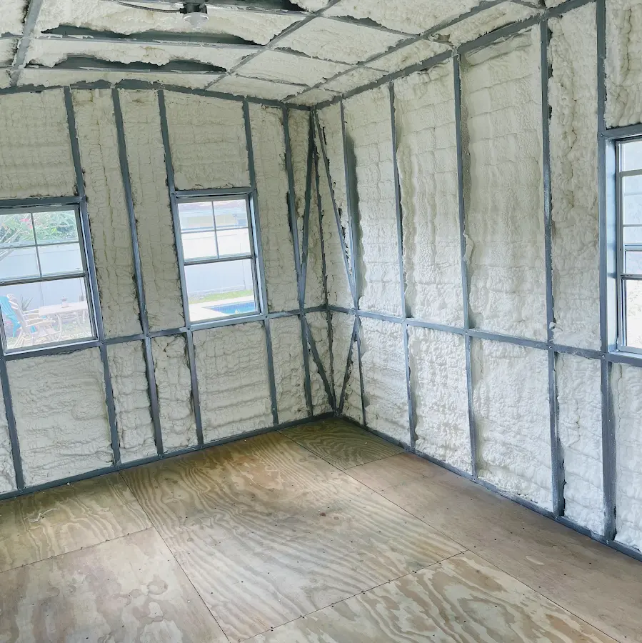 Closed-cell spray foam insulation applied to wall cavities in a residential project in Greenbrier